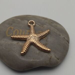 Starfish gold tone‎ charm